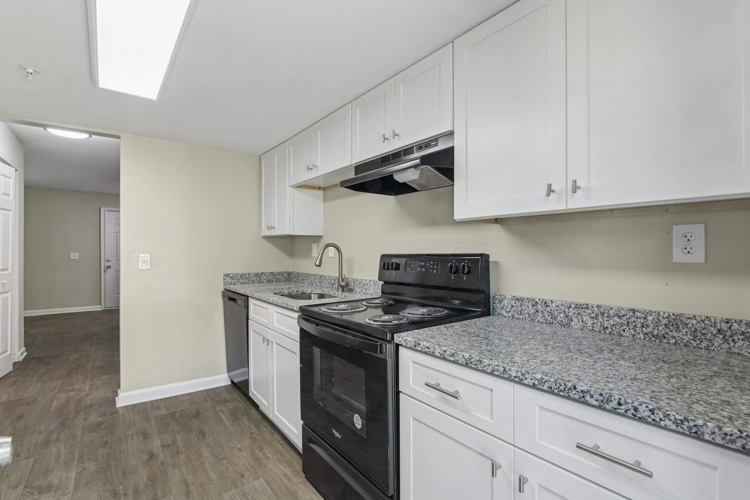 Renovated kitchen with modern finishes at Flourish Park in Clarkston, GA.